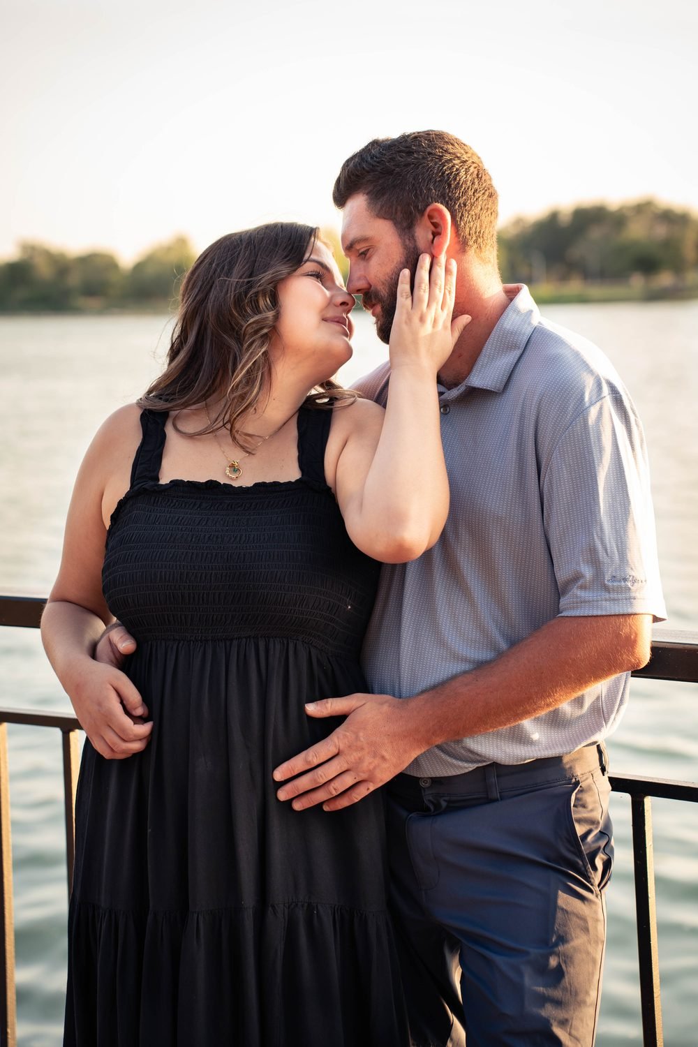 Couple at golden hour on the Amherstburg waterfront along the Detroit River