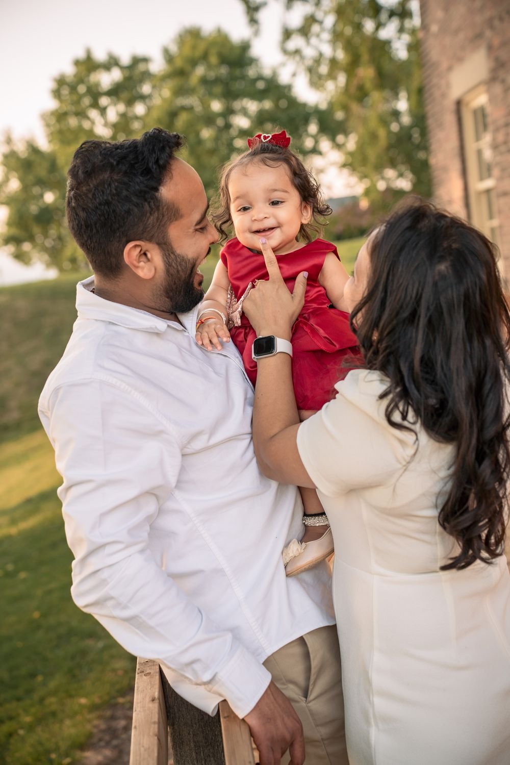 Family celebrating a first birthday photographed in Windsor Ontario